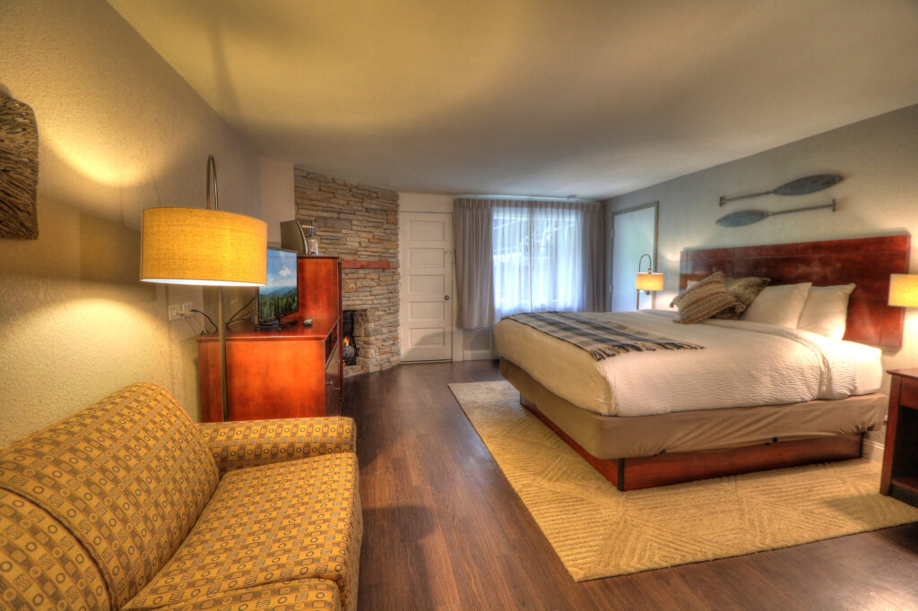 Deluxe King room with fireplace at River Edge Inn Gatlinburg