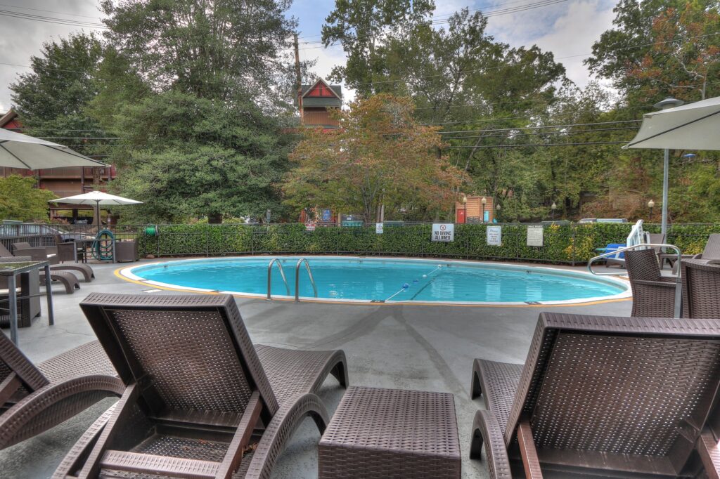 Lounge seating by the pool at River Edge Inn Gatlinburg