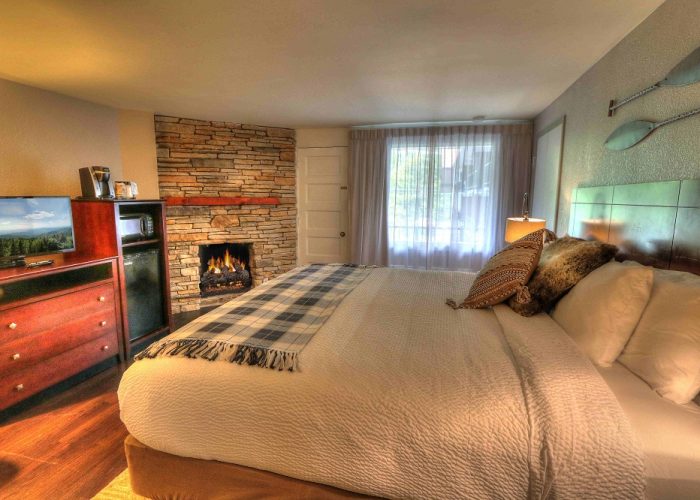 Deluxe King room with gas fireplace at River Edge Inn Gatlinburg