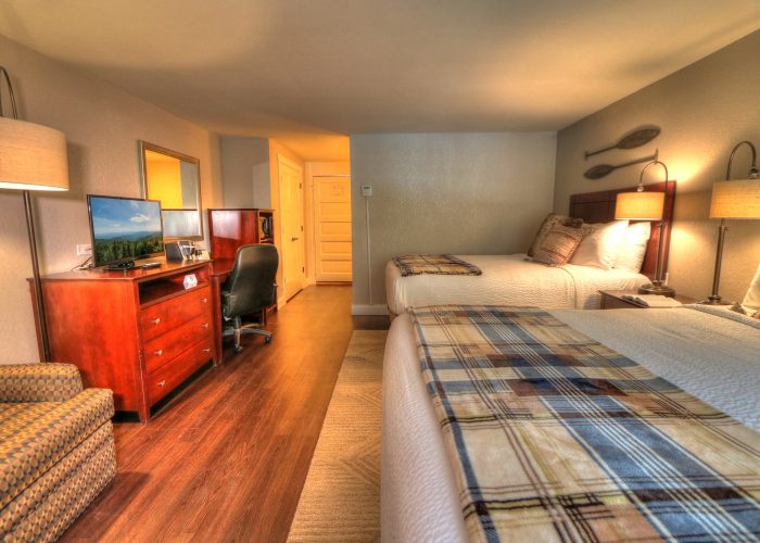 Deluxe room with two queen beds at River Edge Inn Gatlinburg