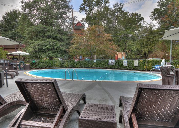 Lounge seating by the pool at River Edge Inn Gatlinburg